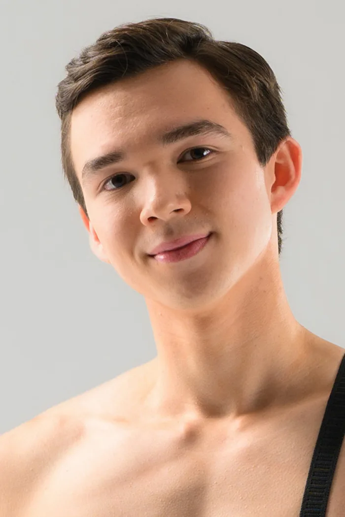 Portrait of Karl Pil seated in rehearsal clothes